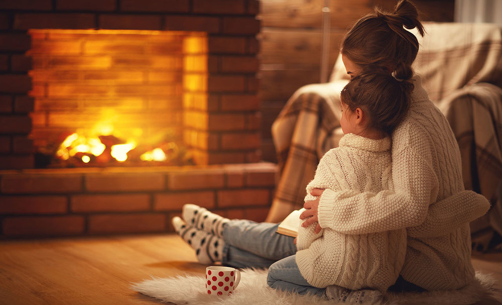 Mom and Child by fireplace