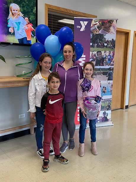 The Bauer Family Wins the YMCA Raffle Basket