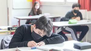 Students in masks at desks