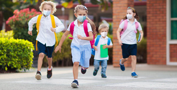 Kids running in masks